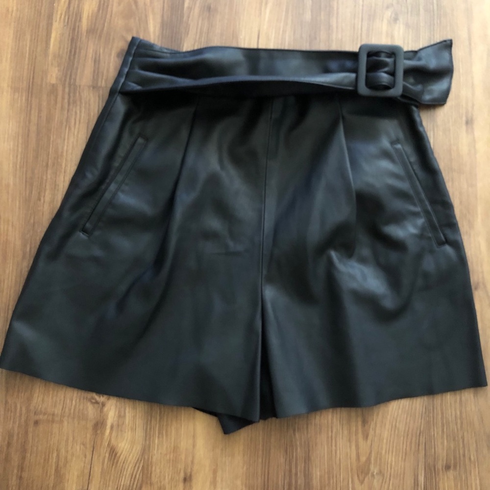 Black faux leather shorts with waist belt